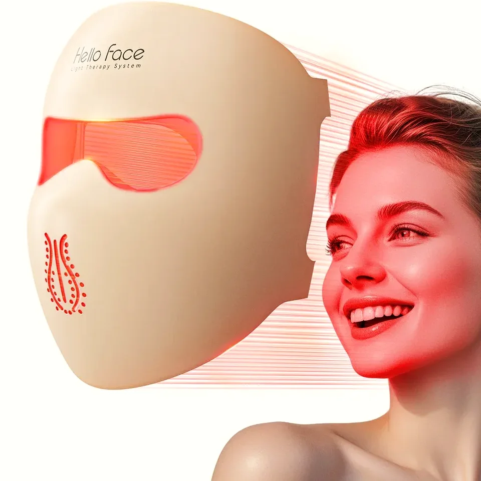 Woman smiling next to the glowing mask